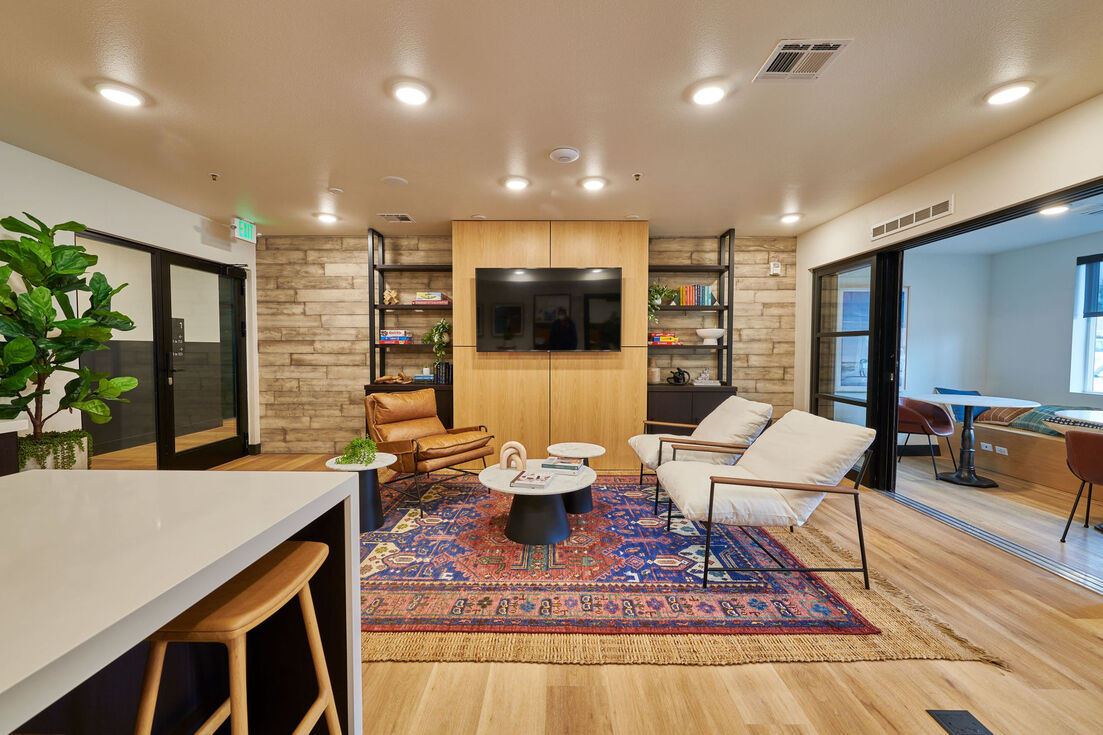 Clubhouse lounge with TV at Westbury Apartments in the Denver Metro Area